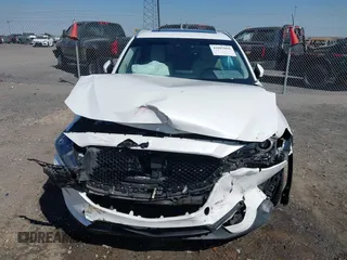 2018 Mazda CX-5 Grand Touring with VIN JM3KFBDM0J0404635, listed as a IAAI auction lot 41883068 with 71,178 mi miles. Bid and sale history available at carsss.com. Image 6.