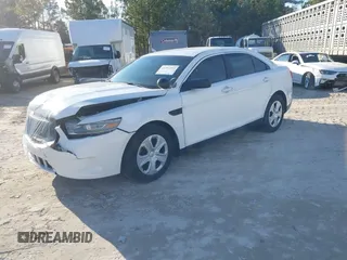 2014 Ford Police Interceptor z VIN 1FAHP2MK2EG125804, wystawiony jako IAAI lot #41297103 z przebiegiem 99 340 mil mil oraz . Historia ofert i sprzedaży dostępna na DreamBid. Obrazek 17.