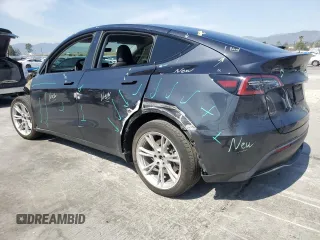 2024 Tesla Model Y Long Range z VIN 7SAYGDEE0RF024326, wystawiony jako Copart lot #52149675 z przebiegiem 34 503 mil mil oraz Szkoda całkowita • Salvage title. Historia ofert i sprzedaży dostępna na DreamBid. Obrazek 2.