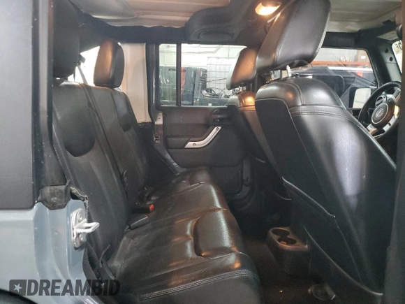 2013 Jeep Wrangler Unlimited Rubicon with VIN 1C4BJWFG7DL691514, listed as a Copart auction lot 42449245 with 114,640 mi miles and Salvage Title. Bid and sale history available at carsss.com. Image 11.