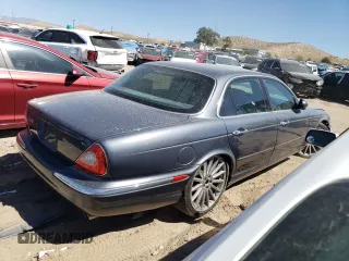 2004 Jaguar XJ with VIN SAJWA73B64TG30921, listed as a Copart auction lot 71267074 with 20,031 mi miles and Salvage Title. Bid and sale history available at carsss.com. Image 3.