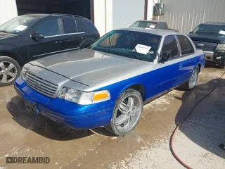 1999 Ford Crown Victoria Police Pkg with VIN 2FAFP71W5XX192230, listed as a IAAI auction lot 41629743 with 170,510 mi miles. Bid and sale history available at carsss.com. Image 2.