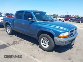 2003 Dodge Dakota SLT z VIN 1D7HL48N83S247654, wystawiony jako IAAI lot #42337656 z przebiegiem 169 001 mil mil oraz . Historia ofert i sprzedaży dostępna na DreamBid. Obrazek 1.