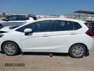 2015 Honda Fit LX with VIN 3HGGK5G57FM748159, listed as a IAAI auction lot 42344168 with 176,716 mi miles and . Bid and sale history available at DreamBid. Image 14.