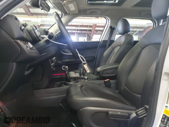 2019 MINI Countryman Cooper with VIN WMZYV5C54K3F58009, listed as a Copart auction lot 53679575 with 104,735 mi miles and Salvage title. Bid and sale history available at DreamBid. Image 7.