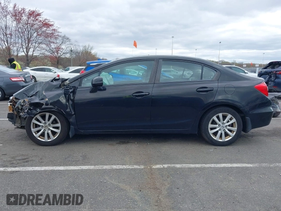 2012 Honda Civic EX with VIN 19XFB2F86CE341668, listed as a IAAI auction lot 42013980 with 187,425 mi miles and . Bid and sale history available at DreamBid. Image 14.