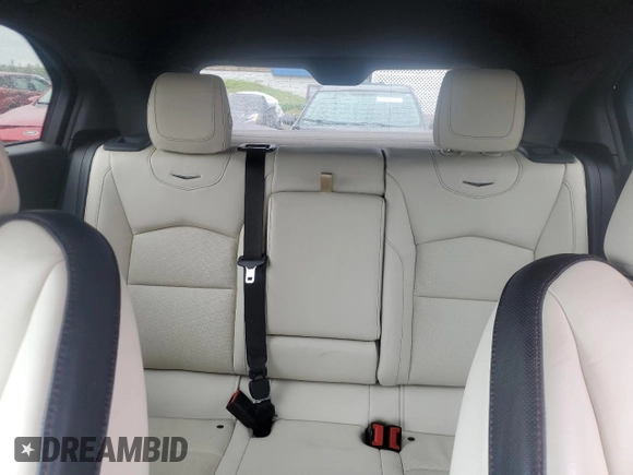 2022 Cadillac XT4 AWD Sport с VIN 1GYFZFR46NF170841, выставлен на аукционе Copart как лот 55863705 с пробегом 14 745 миль миль и Списание • Salvage title. История ставок и продаж доступна на DreamBid. Изображение 10.