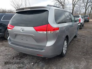 2013 Toyota Sienna XLE with VIN 5TDDK3DC7DS056599, listed as a IAAI auction lot 41736510 with 120,230 mi miles and . Bid and sale history available at DreamBid. Image 4.