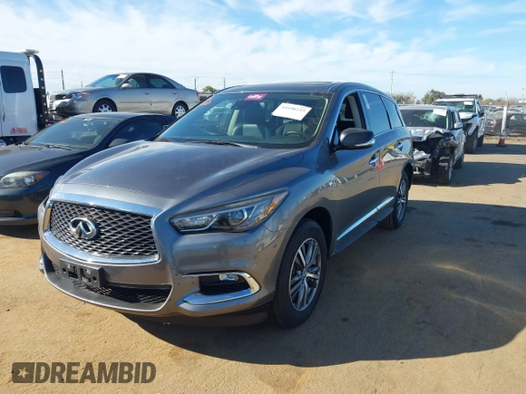 2020 Infiniti QX60 Luxe with VIN 5N1DL0MN5LC520126, listed as a IAAI auction lot 41698233 with 75,249 mi miles and . Bid and sale history available at DreamBid. Image 17.