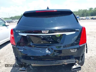 2018 Cadillac XT5 Premium Luxury AWD z VIN 1GYKNFRS3JZ112459, wystawiony jako IAAI lot #42590258 z przebiegiem 157 377 mil mil oraz . Historia ofert i sprzedaży dostępna na DreamBid. Obrazek 6.