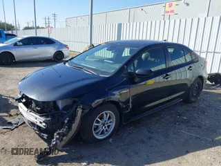 2021 Toyota Corolla Hybrid LE with VIN JTDEAMDE8MJ034218, listed as a IAAI auction lot 41692711 with 65,651 mi miles. Bid and sale history available at carsss.com. Image 19.
