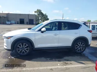 2017 Mazda CX-5 Grand Touring with VIN JM3KFADLXH0222341, listed as a IAAI auction lot 41990464 with 94,374 mi miles and . Bid and sale history available at carsss.com. Image 15.
