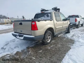 2003 Ford Explorer Sport Trac XLS with VIN 1FMZU77E33UA31967, listed as a IAAI auction lot 41607832 with 144,528 mi miles. Bid and sale history available at carsss.com. Image 4.