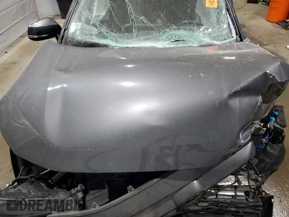 2019 Toyota RAV4 XLE with VIN 2T3P1RFV0KW059311, listed as a Copart auction lot 59777515 with Not provided miles and Salvage title. Bid and sale history available at DreamBid. Image 12.