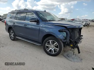 2022 Ford Expedition XLT with VIN 1FMJU1HT0NEA49153, listed as a Copart auction lot 69205714 with 26,429 mi miles and Salvage Title. Bid and sale history available at carsss.com. Image 4.