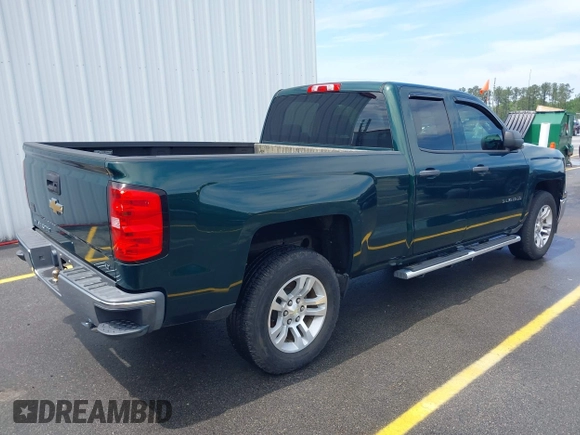 2014 Chevrolet Silverado 1500 LT with VIN 1GCRCREH2EZ323115, listed as a IAAI auction lot 42055949 with 61,337 mi miles and . Bid and sale history available at DreamBid. Image 4.