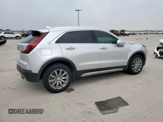 2020 Cadillac XT4 FWD Premium Luxury z VIN 1GYFZCR42LF115413, wystawiony jako Copart lot #56746785 z przebiegiem 41 296 mil mil oraz Szkody całkowita. Historia ofert i sprzedaży dostępna na DreamBid. Obrazek 3.