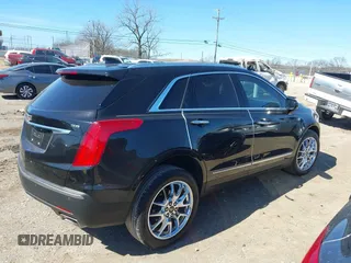 2017 Cadillac XT5 Premium Luxury FWD z VIN 1GYKNCRS8HZ127001, wystawiony jako IAAI lot #41698197 z przebiegiem 120 978 mil mil oraz . Historia ofert i sprzedaży dostępna na DreamBid. Obrazek 13.