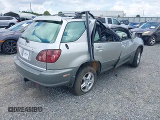 1999 Lexus RX 300 Luxury SUV with VIN JT6HF10U6X0048551, listed as a IAAI auction lot 39826424 with 1 mi miles. Bid and sale history available at carsss.com. Image 4.