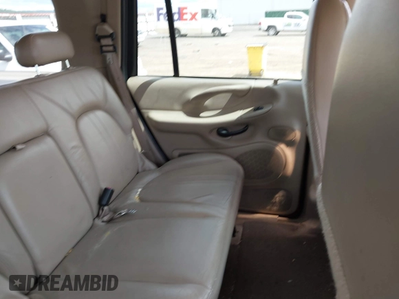2002 Ford Expedition Eddie Bauer with VIN 1FMPU18LX2LA99978, listed as a IAAI auction lot 42692578 with 143,127 mi miles and . Bid and sale history available at DreamBid. Image 8.