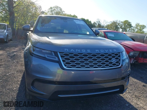 2020 Land Rover Range Rover Velar S z VIN SALYB2EXXLA295307, wystawiony jako IAAI lot #41971330 z przebiegiem 12 192 mil mil oraz . Historia ofert i sprzedaży dostępna na DreamBid. Obrazek 12.