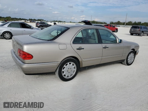 1999 Mercedes-Benz E-Class with VIN WDBJF82H9XX022535, listed as a Copart auction lot 86554534 with 140,904 mi miles and Salvage Title. Bid and sale history available at carsss.com. Image 3.