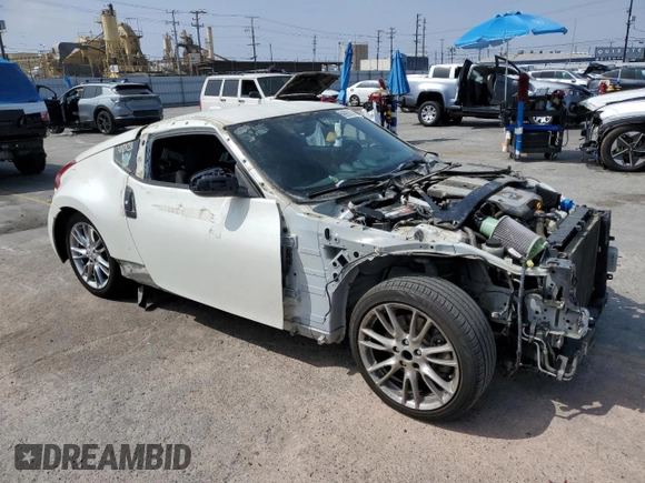 2013 Nissan 370Z with VIN JN1AZ4EH9DM381266, listed as a Copart auction lot 59989515 with 170,900 mi miles and Salvage title. Bid and sale history available at DreamBid. Image 4.