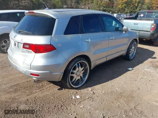 2007 Acura RDX with VIN 5J8TB18277A000909, listed as a IAAI auction lot 40921086 with 154,649 mi miles. Bid and sale history available at carsss.com. Image 4.
