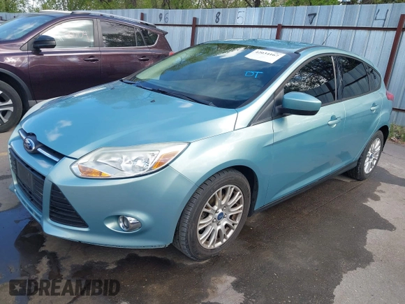 2012 Ford Focus SE with VIN 1FAHP3K24CL394495, listed as a IAAI auction lot 42034167 with 66,833 mi miles and . Bid and sale history available at carsss.com. Image 2.