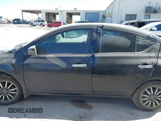 2015 Nissan Versa SV with VIN 3N1CN7AP5FL898189, listed as a IAAI auction lot 41797118 with 206,357 mi miles. Bid and sale history available at carsss.com. Image 13.