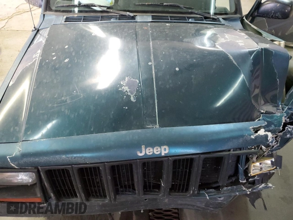 1997 Jeep Cherokee SE with VIN 1J4FJ28S1VL582070, listed as a Copart auction lot 43194435 with 192,534 mi miles and Salvage Title. Bid and sale history available at carsss.com. Image 13.