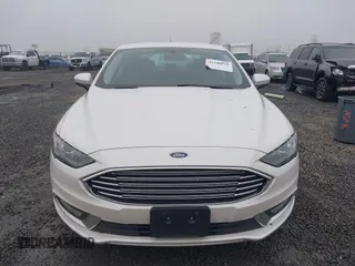 2017 Ford Fusion SE z VIN 3FA6P0H71HR201799, wystawiony jako IAAI lot #41346018 z przebiegiem 51 126 mil mil oraz . Historia ofert i sprzedaży dostępna na DreamBid. Obrazek 12.