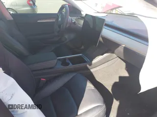 2023 Tesla Model 3 with VIN 5YJ3E1EA1PF385490, listed as a IAAI auction lot 42315884 with 17,590 mi miles and . Bid and sale history available at DreamBid. Image 5.