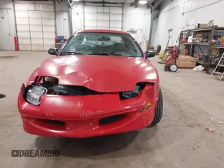 1999 Pontiac Sunfire SE z VIN 1G2JB524XX7547651, wystawiony jako IAAI lot #41962158 z przebiegiem 130 385 mil mil oraz . Historia ofert i sprzedaży dostępna na DreamBid. Obrazek 12.