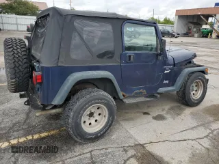 1997 Jeep Wrangler Sport z VIN 1J4FY19S9VP490590, wystawiony jako Copart lot #57492775 z przebiegiem 161 648 mil mil oraz Szkoda całkowita • Salvage title. Historia ofert i sprzedaży dostępna na DreamBid. Obrazek 3.