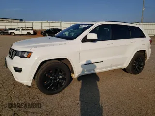 2017 Jeep Grand Cherokee Altitude with VIN 1C4RJEAG9HC702812, listed as a Copart auction lot 62423495 with 162,982 mi miles and Salvage title. Bid and sale history available at DreamBid. Image 1.