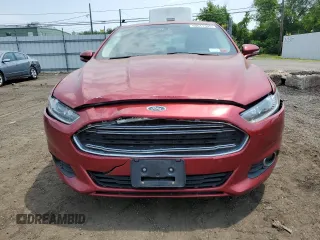 2013 Ford Fusion SE Hybrid z VIN 3FA6P0LUXDR335590, wystawiony jako Copart lot #60541395 z przebiegiem 121 975 mil mil oraz Szkoda całkowita • Salvage title. Historia ofert i sprzedaży dostępna na DreamBid. Obrazek 5.