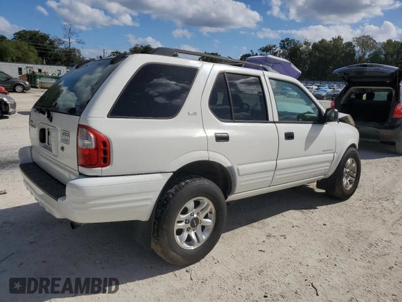 2002 Isuzu Rodeo S with VIN 4S2CK58W124322241, listed as a Copart auction lot 79009994 with 131,793 mi miles and Salvage Title. Bid and sale history available at DreamBid. Image 3.