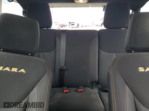 2015 Jeep Wrangler Unlimited Sahara z VIN 1C4BJWEG5FL645846, wystawiony jako Copart lot #53326855 z przebiegiem 122 510 mil mil oraz Szkoda całkowita • Salvage title. Historia ofert i sprzedaży dostępna na DreamBid. Obrazek 10.