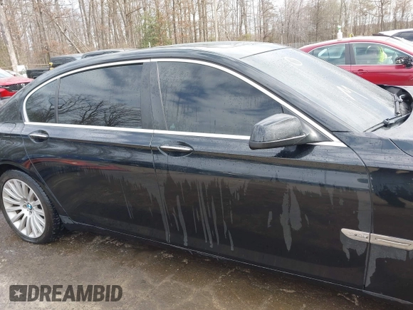 2011 BMW 7 Series 750Li xDrive with VIN WBAKC8C52BC431668, listed as a IAAI auction lot 41623575 with 117,306 mi miles. Bid and sale history available at carsss.com. Image 14.