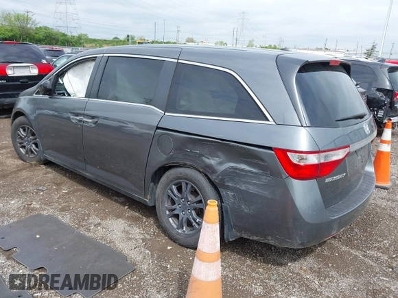 2012 Honda Odyssey EX-L with VIN 5FNRL5H64CB028040, listed as a IAAI auction lot 42126048 with 160,675 mi miles and . Bid and sale history available at DreamBid. Image 3.