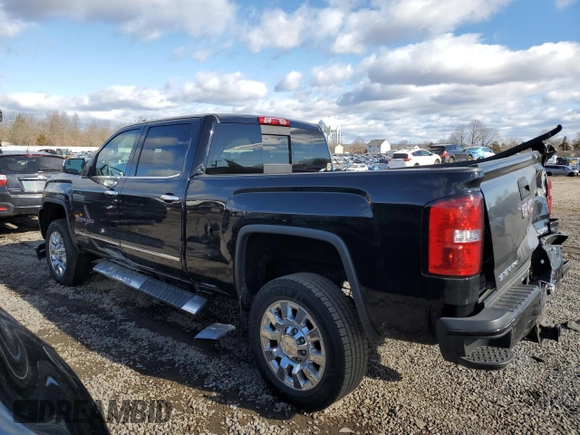 2017 GMC Sierra 2500HD Denali z VIN 1GT12UEG1HF104744, wystawiony jako Copart lot #43969425 z przebiegiem 129 674 mil mil oraz Szkoda całkowita • Salvage title. Historia ofert i sprzedaży dostępna na DreamBid. Obrazek 2.