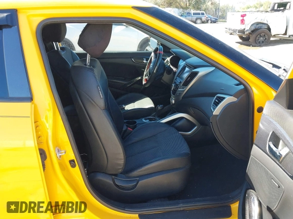 2013 Hyundai Veloster w/Gray Int with VIN KMHTC6AD8DU093272, listed as a IAAI auction lot 40407768 with 91,038 mi miles and . Bid and sale history available at DreamBid. Image 5.