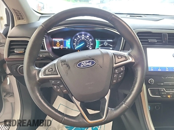 2020 Ford Fusion SEL with VIN 3FA6P0CD1LR154201, listed as a IAAI auction lot 42715761 with 99,448 mi miles and . Bid and sale history available at DreamBid. Image 29.