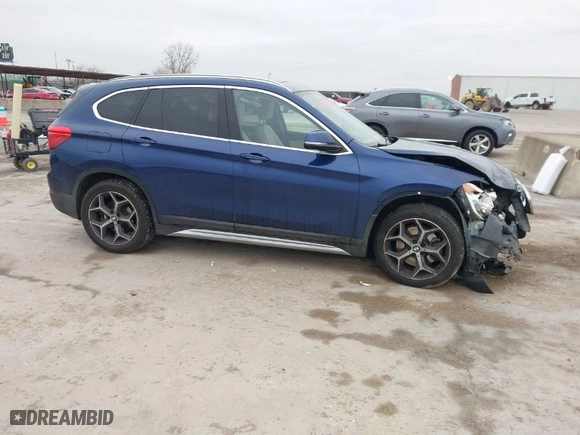 2018 BMW X1 sDrive28i with VIN WBXHU7C36J5L09761, listed as a IAAI auction lot 41441722 with 103,987 mi miles. Bid and sale history available at carsss.com. Image 14.