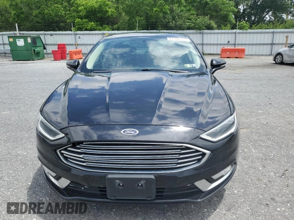 2017 Ford Fusion Titanium z VIN 3FA6P0K92HR192881, wystawiony jako Copart lot #61190515 z przebiegiem 109 834 mil mil oraz Szkoda całkowita • Salvage title. Historia ofert i sprzedaży dostępna na DreamBid. Obrazek 5.