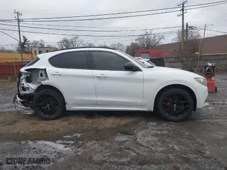 2021 Alfa Romeo Stelvio Ti with VIN ZASPAKBNXM7D15764, listed as a IAAI auction lot 41502764 with 48,714 mi miles. Bid and sale history available at carsss.com. Image 13.