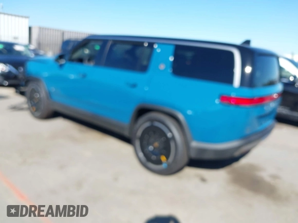 2025 Rivian R1S Adventure with VIN 7PDSGBBA9SN056202, listed as a IAAI auction lot 40766927 with 1,688 mi miles. Bid and sale history available at carsss.com. Image 3.