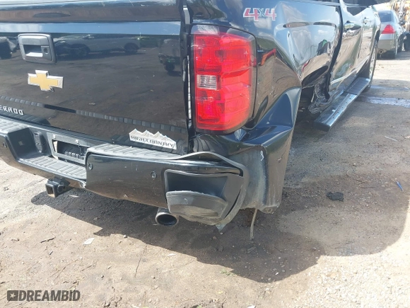2015 Chevrolet Silverado 1500 High Country with VIN 3GCUKTEC9FG355379, listed as a IAAI auction lot 41923900 with 253,497 mi miles. Bid and sale history available at carsss.com. Image 18.