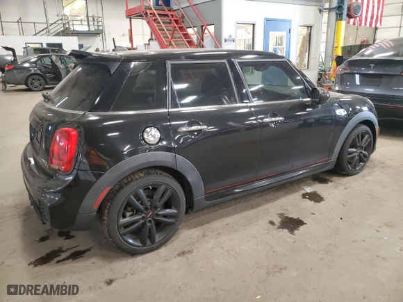 2016 MINI Cooper Hardtop 4 Door S with VIN WMWXU3C5XG2B63166, listed as a Copart auction lot 84016934 with 58,921 mi miles and Salvage Title. Bid and sale history available at carsss.com. Image 3.